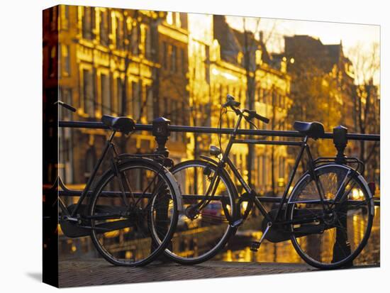 Bikes, Amsterdam, Holland-Peter Adams-Stretched Canvas