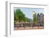 Bikes and houses along canal at dusk at intersection of Herengracht and Brouwersgracht, Amsterda...-null-Framed Photographic Print