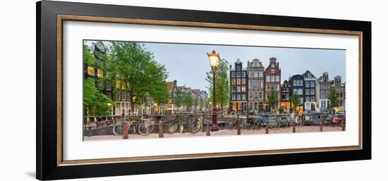 Bikes and Houses Along Canal at Dusk at Intersection of Herengracht and Brouwersgracht-null-Framed Photographic Print