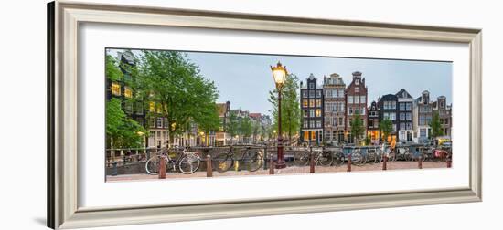 Bikes and Houses Along Canal at Dusk at Intersection of Herengracht and Brouwersgracht-null-Framed Photographic Print