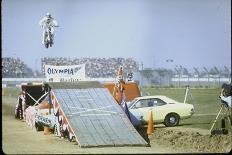 Daredevil Motorcyclist Evel Knievel Rising Very High Off Platform During Performance of a Stunt-Bill Eppridge-Photographic Print