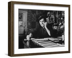 Bill Graham, Owner of Filmores East and West, Talking on Phone as He Works in His Office-John Olson-Framed Premium Photographic Print