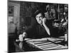 Bill Graham, Owner of Filmores East and West, Talking on Phone as He Works in His Office-John Olson-Mounted Photographic Print