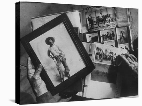 Bill Pickett, Cowboy in Framed Photo of Scrapbook of Cowhand Johnny Mullin-null-Stretched Canvas