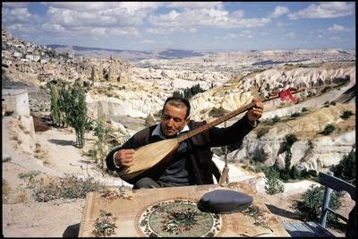 Turkish Man Playing a Type of Mandolin Called a Sis