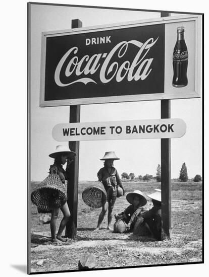 Billboard Advertising Coca Cola at Outskirts of Bangkok with Welcoming Sign "Welcome to Bangkok"-Dmitri Kessel-Mounted Photographic Print