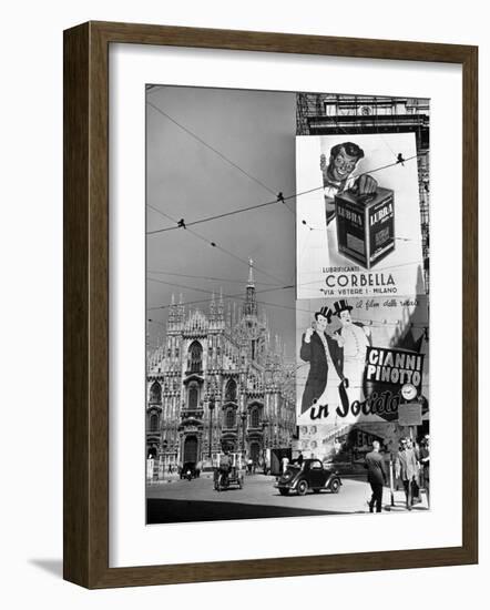 Billboard in the Piazza Del Duomo features Abbott and Costello, Whom Italians Call Cianni E Pinotto-Alfred Eisenstaedt-Framed Photographic Print