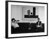 Billy Wilder in His Hollywood Office, Looking Through Binoculars-Gjon Mili-Framed Premium Photographic Print