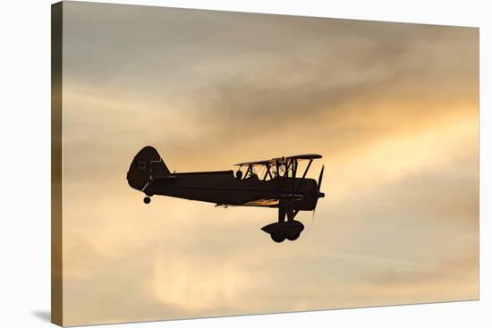 Biplane fly-by at Madras Airshow, Oregon.-William Sutton-Stretched Canvas