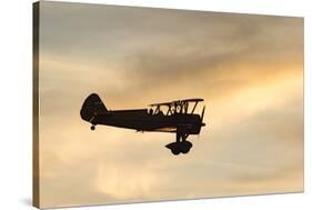 Biplane fly-by at Madras Airshow, Oregon.-William Sutton-Stretched Canvas