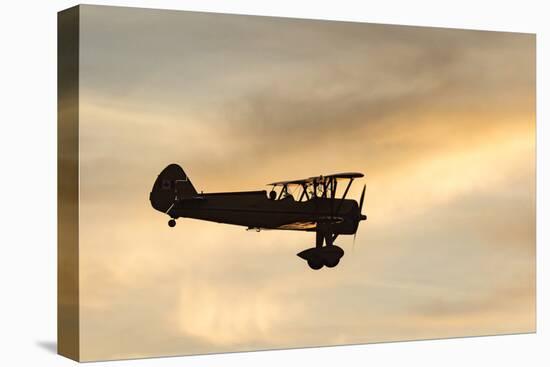 Biplane fly-by at Madras Airshow, Oregon.-William Sutton-Stretched Canvas