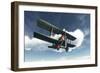 Biplane Flying in Blue Cloudy Sky-Stocktrek Images-Framed Art Print