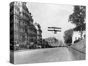 Biplane Flying over Washington-null-Stretched Canvas