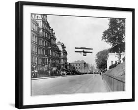 Biplane Flying over Washington-null-Framed Photographic Print