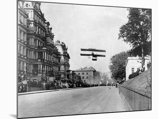 Biplane Flying over Washington-null-Mounted Photographic Print