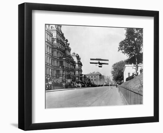 Biplane Flying over Washington-null-Framed Photographic Print