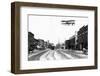 Biplane over a Small Town-J.H. Cave-Framed Photographic Print