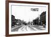 Biplane over a Small Town-J.H. Cave-Framed Photographic Print