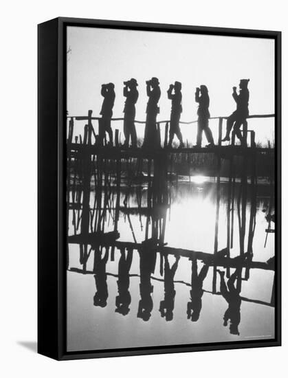 Bird Counters of the Audubon Society Standing on a Bridge-Francis Miller-Framed Stretched Canvas