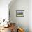 Bison bulls grazing at the National Bison Range in Moiese, Montana, USA-Chuck Haney-Framed Photographic Print displayed on a wall