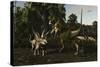 Bistahieversor Attacking a Pair of Pentaceratops-null-Stretched Canvas