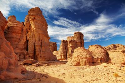https://imgc.allpostersimages.com/img/posters/bizarre-sandstone-cliffs-in-sahara-desert-tassili-n-ajjer-algeria_u-L-Q105EYW0.jpg?artPerspective=n