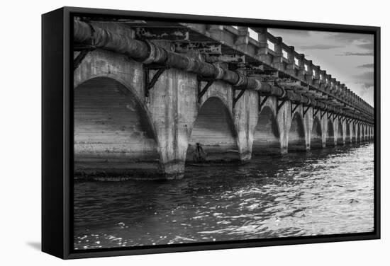 Black and White Horizontal Image of an Old Arch Bridge in Near Ramrod Key, Florida-James White-Framed Stretched Canvas