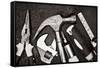 Black and White Image of a Set of Tools on a Textured Metallic Background-Kamira-Framed Stretched Canvas