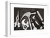 Black and White Image of a Set of Tools on a Textured Metallic Background-Kamira-Framed Photographic Print