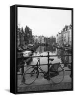 Black and White Image of an Old Bicycle by the Singel Canal, Amsterdam, Netherlands, Europe-Amanda Hall-Framed Stretched Canvas