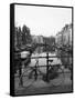 Black and White Image of an Old Bicycle by the Singel Canal, Amsterdam, Netherlands, Europe-Amanda Hall-Framed Stretched Canvas