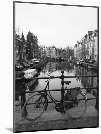 Black and White Image of an Old Bicycle by the Singel Canal, Amsterdam, Netherlands, Europe-Amanda Hall-Mounted Photographic Print