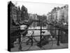 Black and White Imge of an Old Bicycle by the Singel Canal, Amsterdam, Netherlands, Europe-Amanda Hall-Stretched Canvas