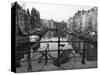 Black and White Imge of an Old Bicycle by the Singel Canal, Amsterdam, Netherlands, Europe-Amanda Hall-Stretched Canvas