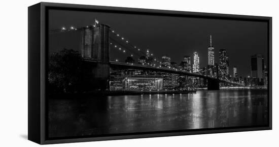 Black and white Manhattan skyline from Brooklyn Bridge park with reflection in the East River-David Chang-Framed Stretched Canvas