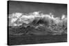 Black and white of South Georgia Island. Opening in clouds and Virga reveal the landscape.-Howie Garber-Stretched Canvas