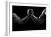 Black and white photo of arm wresting-Pete Saloutos-Framed Photographic Print