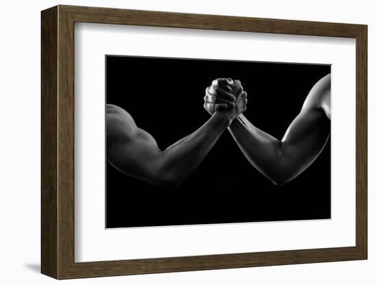 Black and white photo of arm wresting-Pete Saloutos-Framed Photographic Print