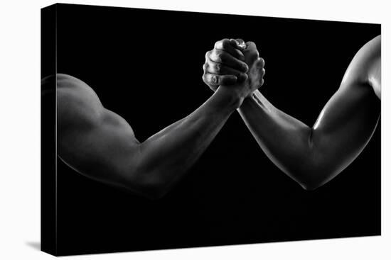 Black and white photo of arm wresting-Pete Saloutos-Stretched Canvas