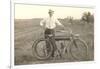 Black and White Photo of Man with Vintage Motorcycle-null-Framed Art Print