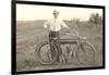 Black and White Photo of Man with Vintage Motorcycle-null-Framed Art Print