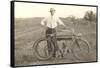 Black and White Photo of Man with Vintage Motorcycle-null-Framed Stretched Canvas