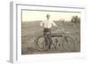 Black and White Photo of Man with Vintage Motorcycle-null-Framed Art Print