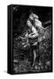 Black and white picture of a Sherpa carrying meat up to Everest Base Camp in Nepal-David Chang-Framed Stretched Canvas