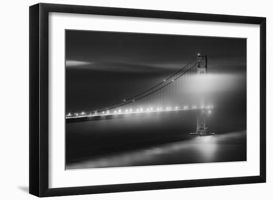 Black And White View Of The Golden Gate Bridge At Night With Silky Low Fog Around The Tower-Joe Azure-Framed Photographic Print