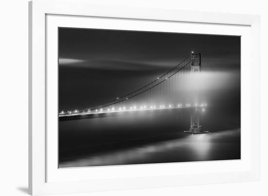 Black And White View Of The Golden Gate Bridge At Night With Silky Low Fog Around The Tower-Joe Azure-Framed Photographic Print