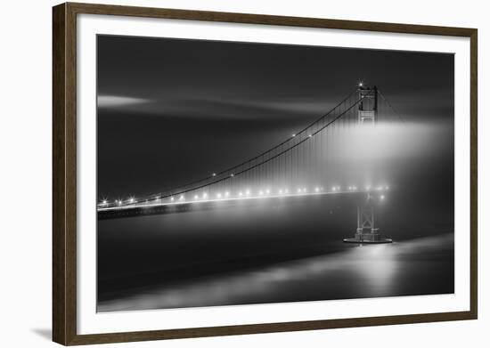 Black And White View Of The Golden Gate Bridge At Night With Silky Low Fog Around The Tower-Joe Azure-Framed Photographic Print