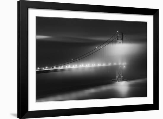 Black And White View Of The Golden Gate Bridge At Night With Silky Low Fog Around The Tower-Joe Azure-Framed Photographic Print