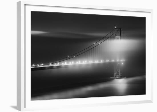 Black And White View Of The Golden Gate Bridge At Night With Silky Low Fog Around The Tower-Joe Azure-Framed Photographic Print