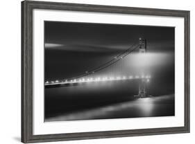 Black And White View Of The Golden Gate Bridge At Night With Silky Low Fog Around The Tower-Joe Azure-Framed Photographic Print